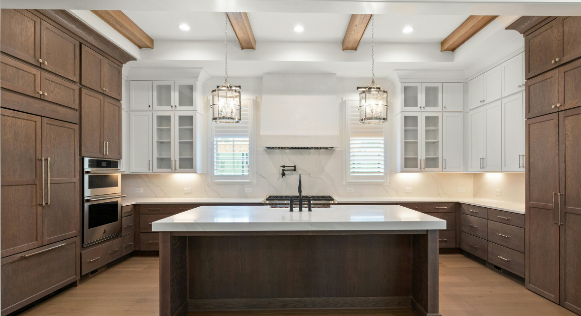 Fitted kitchen with island and wooden cabinets