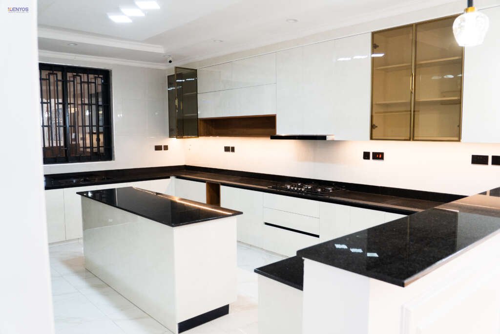 White Gloss Kitchens: Pairing UV Gloss Boards with Dark Worktops